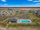 Aerial view of community featuring pool, clubhouse, and well-maintained homes in a desirable location at 8996 Sw 49Th Cir, Ocala, FL 34476