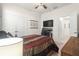 Bright bedroom featuring carpet, a ceiling fan, and ample space for a home office at 8996 Sw 49Th Cir, Ocala, FL 34476