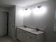 Modern bathroom with double sinks and granite countertop at 13083 Sw 61St Place Rd, Ocala, FL 34481