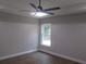 Bedroom with ceiling fan and wood flooring at 13083 Sw 61St Place Rd, Ocala, FL 34481