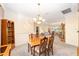 Bright dining area with a view into the living room at 9500 Sw 93Rd Loop, Ocala, FL 34481