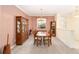 Dining room features a chandelier and built-in shelving at 9500 Sw 93Rd Loop, Ocala, FL 34481