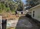 Spacious backyard with shed and patio area at 1105 Ne 45 Pl, Ocala, FL 34479