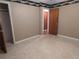 Bright bedroom featuring a closet and access to another room at 1105 Ne 45 Pl, Ocala, FL 34479