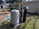 Exterior water system with pressure tank and filter at 1105 Ne 45 Pl, Ocala, FL 34479