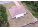 Aerial view of the home showcasing the fenced backyard and the surrounding landscape at 15747 Sw 47Th Avenue Rd, Ocala, FL 34473