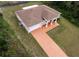Aerial view showcasing the home's location, private backyard, and attached garage at 15747 Sw 47Th Avenue Rd, Ocala, FL 34473