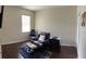 Bedroom with a leather recliner and accent furniture at 15747 Sw 47Th Avenue Rd, Ocala, FL 34473