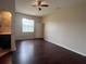 View of bedroom with wood floors and connected to the bathroom at 15747 Sw 47Th Avenue Rd, Ocala, FL 34473