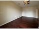 Bedroom featuring hardwood floors and ceiling fan at 15747 Sw 47Th Avenue Rd, Ocala, FL 34473