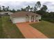 Charming single-Gathering home with an attached garage and a spacious driveway at 15747 Sw 47Th Avenue Rd, Ocala, FL 34473