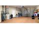 Spacious garage with an automatic door, storage, and an utility sink at 15747 Sw 47Th Avenue Rd, Ocala, FL 34473