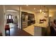 Modern kitchen with stainless steel appliances, granite countertops, and ample cabinet space at 15747 Sw 47Th Avenue Rd, Ocala, FL 34473