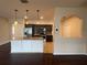 Modern kitchen with stainless steel appliances, granite countertops, and a stylish island at 15747 Sw 47Th Avenue Rd, Ocala, FL 34473