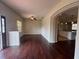 Inviting living room with hardwood floors seamlessly flowing into the open kitchen at 15747 Sw 47Th Avenue Rd, Ocala, FL 34473