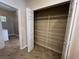 Walk-in pantry offering ample storage with adjustable shelving for organization at 15747 Sw 47Th Avenue Rd, Ocala, FL 34473