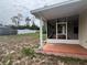 Covered patio looking out to the yard at 15747 Sw 47Th Avenue Rd, Ocala, FL 34473
