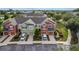 Beautiful townhome exteriors showcase attached garages, vibrant landscaping, and colorful facades at 4230 Sw 50Th Cir, Ocala, FL 34474