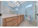 Bathroom with tile floors, a large mirror, a double vanity, a toilet and a shower at 8655 Sw 86Th Cir, Ocala, FL 34481