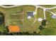 Aerial view showing home, pool, barn and paddocks at 11098 Nw 50Th Ln, Ocala, FL 34482