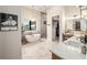 Elegant bathroom with soaking tub, walk-in shower, and double vanity at 11098 Nw 50Th Ln, Ocala, FL 34482