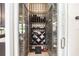 Custom wine cellar with ample storage for wine bottles at 11098 Nw 50Th Ln, Ocala, FL 34482