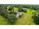 Wide aerial view showcasing the home and grounds at 2291 Sw 76Th Ln, Ocala, FL 34476