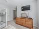 Bedroom with bunkbed, dresser, mirror and gray carpeting at 11831 Sw Highway 484, Dunnellon, FL 34432