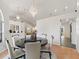 Dining room with hardwood floors, chandelier lighting, and seating for six at 11831 Sw Highway 484, Dunnellon, FL 34432