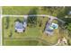 Two houses, pool, and expansive green space at 7137 & 7141 S Magnolia Ave, Ocala, FL 34476