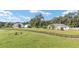 Two houses and lush green landscape at 7137 & 7141 S Magnolia Ave, Ocala, FL 34476