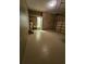 Spacious basement with utility connections and a door to the backyard at 9180 Sw 202Nd Avenue Road, Dunnellon, FL 34431