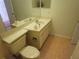 Bathroom with toilet, vanity, mirror, and tile floor at 9180 Sw 202Nd Avenue Road, Dunnellon, FL 34431