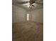 Bedroom with a ceiling fan and carpet at 9180 Sw 202Nd Avenue Road, Dunnellon, FL 34431