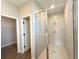 Modern bathroom featuring a seamless glass shower enclosure and neutral tile at 4062 Sw 114Th St, Ocala, FL 34476