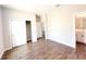 Bright bedroom with wood-look tile flooring and a closet with sliding doors at 4062 Sw 114Th St, Ocala, FL 34476