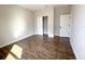 Cozy bedroom with wood-look tile flooring, closet, and natural light at 4062 Sw 114Th St, Ocala, FL 34476