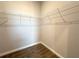 Walk-in closet with installed shelving for optimal storage and organization at 4062 Sw 114Th St, Ocala, FL 34476