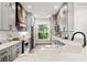 Modern kitchen with gray cabinets and marble counters at 925 Se 13Th St, Ocala, FL 34471