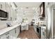 Modern kitchen with stainless steel appliances and white shaker cabinets at 925 Se 13Th St, Ocala, FL 34471