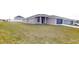 New single-story house with a large grassy yard at 5348 Se 91St Pl, Ocala, FL 34480