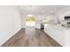 Kitchen dining area with hardwood floors and sliding glass door at 14293 Sw 32Nd Pl, Ocala, FL 34481