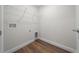 Empty Laundry Room featuring tile floor and a wire rack at 14409 Sw 30Th Pl, Ocala, FL 34481