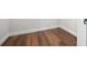 Hardwood flooring and white trim in the walk-in closet at 14409 Sw 30Th Pl, Ocala, FL 34481