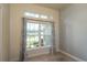 Bedroom featuring a carpet floor, a window with curtains and neutral painted walls at 25 Nw 45Th Loop, Ocala, FL 34475