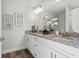 Bathroom with double vanity and granite countertops at 7128 Sw 134Th St, Ocala, FL 34473