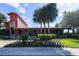 Picturesque clubhouse with lush landscaping, beautiful plantings, and manicured lawn at 4560 Sw 52Nd Cir # 101, Ocala, FL 34474