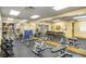 Full gym including free weights, weight machines, and a mirrored wall for form at 4560 Sw 52Nd Cir # 101, Ocala, FL 34474