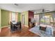Spacious living and dining areas with hardwood floors, modern decor, and lots of natural light at 4560 Sw 52Nd Cir # 101, Ocala, FL 34474