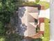 Overhead aerial view of the home with a large roof and well manicured yard at 11696 Sw 71St Cir, Ocala, FL 34476